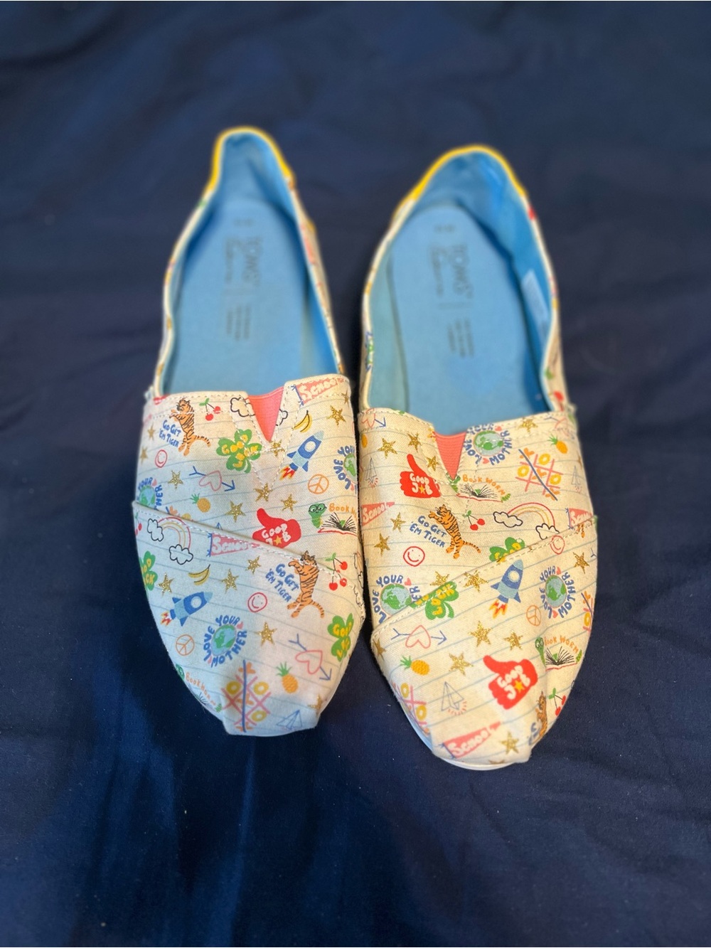 Toms Cream Slip-On Shoes with Multicolor Print